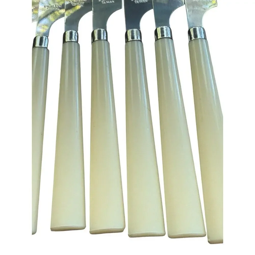 Vintage Cream Colored Plastic Handle Serrated knives 8 Pieces Made Taiwan 1970's